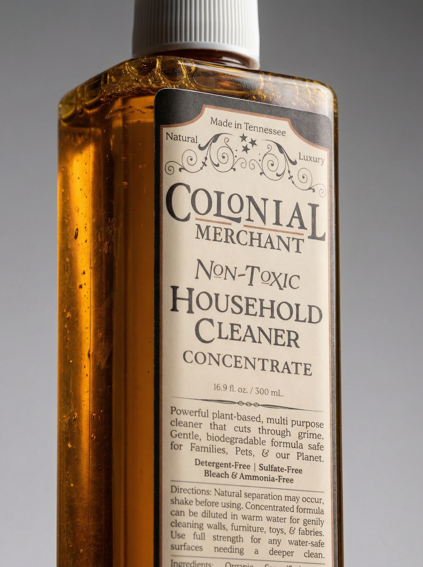 Bottle of Colonial Merchant Non-Toxic Household Cleaner Concentrate with label.